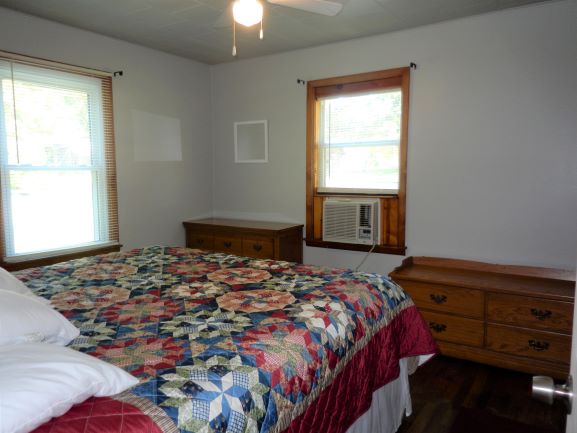 king bedroom in cabin 8